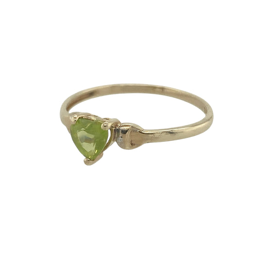 Bring fresh colour and romantic charm to your collection with this pre-owned 9ct yellow and white gold peridot heart ring, a delicate design with symbolic appeal.

Design: The ring features a 5mm heart-shaped peridot at the centre, offering a bright green sparkle in a graceful and feminine style.
Material: Made from 9-carat yellow and white gold, the polished finish enhances the vivid hue of the peridot while adding a refined two-tone touch.