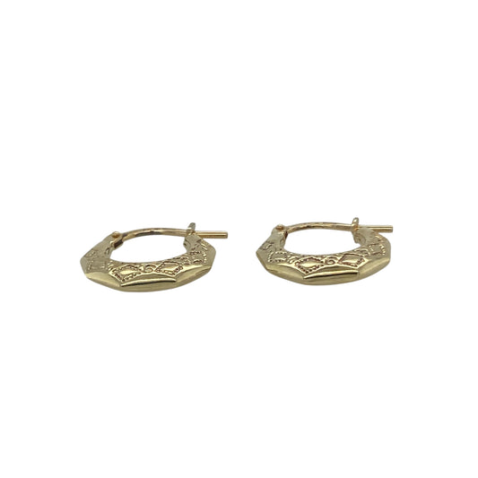 Bring understated elegance and golden warmth to your collection with these pre-owned 9ct yellow gold patterned small creole earrings, offering a timeless design perfect for everyday wear.

Design: The earrings feature a classic small creole shape with delicate patterning, adding subtle detail and refined charm.
Material: Made from 9-carat yellow gold, the polished finish enhances the rich tone and highlights the fine detailing.