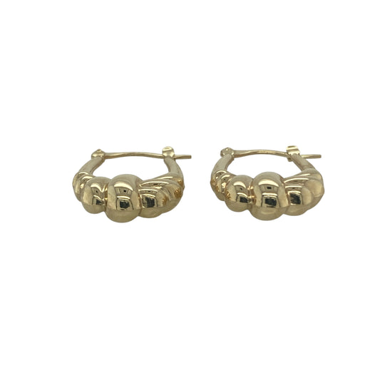 Bring golden texture and timeless style to your collection with these pre-owned 9ct yellow gold twisted oval creole earrings, a refined design with subtle detail.

Design: The earrings feature an oval creole shape with a twisted pattern, creating movement and light-catching appeal.
Material: Made from 9-carat yellow gold, the polished finish enhances the warm tone and highlights the twist design.