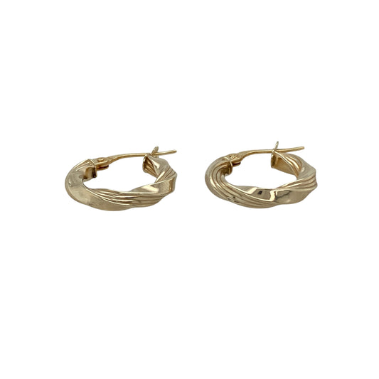 Bring subtle elegance and golden shine to your collection with these pre-owned 9ct yellow gold small twisted hoop creole earrings, a delicate style with timeless appeal.

Design: The earrings feature a small hoop creole shape with a gentle twisted pattern, adding refined texture and light-catching detail.
Material: Made from 9-carat yellow gold, the polished finish enhances the warm tone and highlights the twist design.
