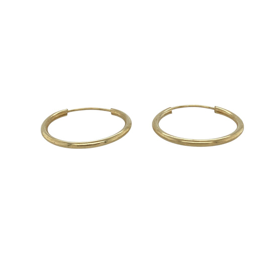 Bring simple elegance and golden warmth to your collection with these pre-owned 9ct yellow gold plain sleeper earrings, a lightweight design perfect for everyday wear.

Design: The earrings feature a classic sleeper style with a smooth plain finish, offering understated simplicity and versatility.
Material: Made from 9-carat yellow gold, the polished surface enhances the rich tone and enduring appeal.