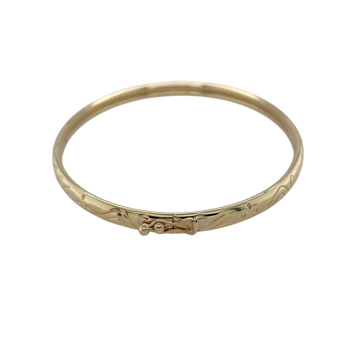 Bring refined style and subtle detail to your collection with this pre-owned 9ct yellow gold patterned hinged bangle, a timeless accessory designed for both everyday elegance and special occasion wear.

Design: The bangle features a classic hinged style with a delicate patterned finish, offering both security and decorative charm in a versatile design.
Material: Made from 9-carat yellow gold, the polished surface highlights the pattern and provides a warm, radiant glow.