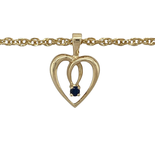 Bring romantic elegance and a touch of colour to your collection with this pre-owned 9ct yellow gold open heart pendant set with sapphire, suspended on an 18-inch Singapore chain—a timeless piece symbolising love and sophistication.

Design: The necklace features a 2.1cm long open heart pendant, including the bail, accented with a single 3mm sapphire for a refined pop of deep blue.