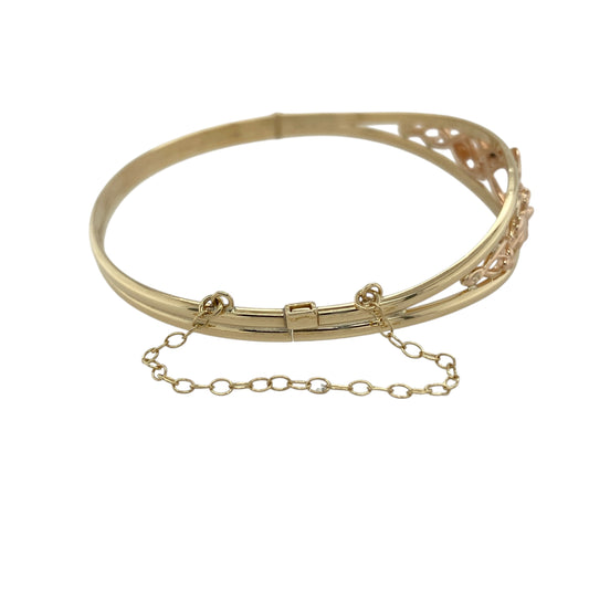 Bring heritage elegance and meaningful design to your collection with this pre-owned 9ct yellow and rose gold Clogau Tree of Life bangle, a timeless piece symbolising growth and continuity.

Design: The bangle features the iconic Tree of Life motif across the 12mm high front, blending intricate yellow and rose gold detailing for a distinctive and symbolic look.
Material: Made from 9-carat yellow and rose gold, the polished finish enhances the bangle’s two-tone design and rich heritage character.
