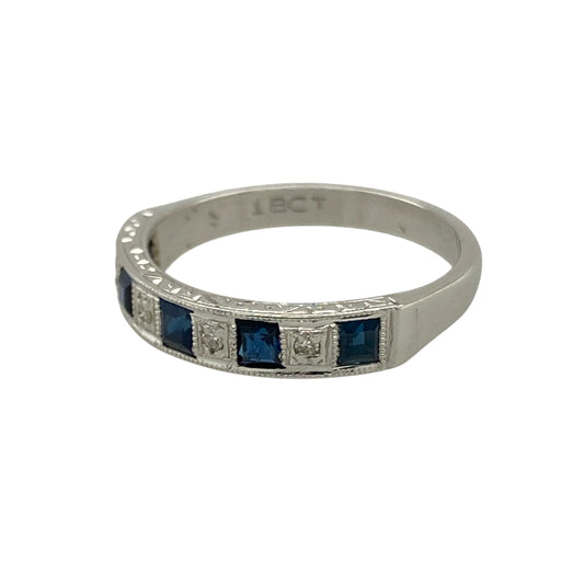 Bring timeless elegance and refined colour to your collection with this pre-owned 18ct white gold diamond and sapphire band ring—a sophisticated design perfect for both everyday wear and special occasions.

Design: The band measures 3.5mm wide at the front and is adorned with alternating diamonds and sapphires, creating a balanced and classic look.
Material: Made from 18-carat white gold, the polished finish enhances the brilliance of the diamonds and the rich blue tones of the sapphires.