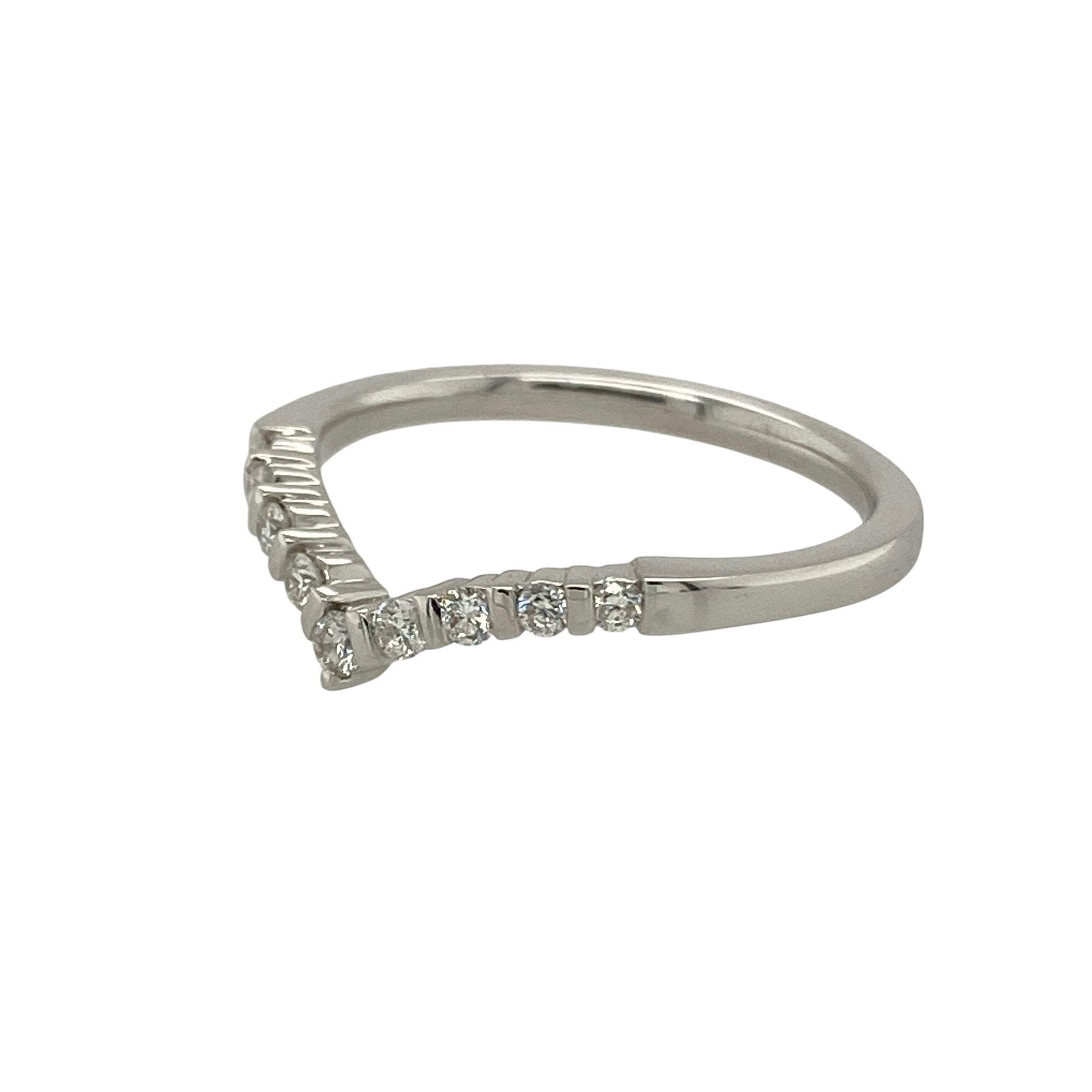 Bring graceful sparkle and elegant shape to your collection with this pre-owned 18ct white gold diamond wishbone ring—a timeless design that pairs beautifully with other rings or shines on its own.

Design: The ring features a classic wishbone shape, delicately set with diamonds along the curve to add brilliance and refinement.
Material: Made from 18-carat white gold, the polished finish enhances the sparkle of the diamonds and adds a sleek, modern touch.