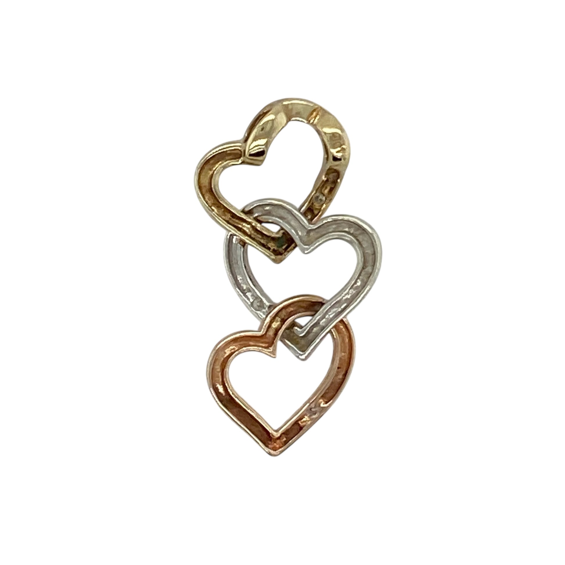 Bring romantic charm and delicate sparkle to your collection with this pre-owned 9ct yellow, rose, and white gold diamond three-heart pendant—a meaningful design symbolising love and unity.

Design: The pendant features three open hearts in yellow, rose, and white gold, accented with sparkling diamonds for added brilliance and detail.
Material: Made from 9-carat yellow, rose, and white gold with diamond accents, the polished finish enhances the warmth of the tri-colour design and the sparkle of the stones.
