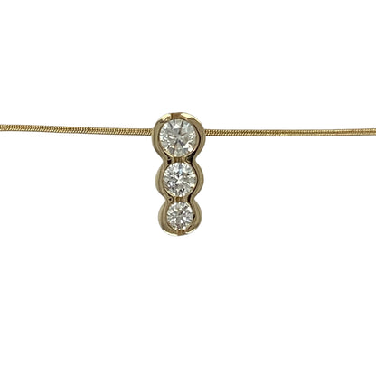 Bring refined sparkle and elegant detail to your collection with this pre-owned 14ct yellow gold three-stone diamond pendant, paired with an 18-inch snake chain for a sleek and timeless finish.

Design: The pendant measures 1.3cm long and features three round brilliant diamonds in a rubover setting, with a total diamond weight of approximately 0.47ct. The stones are graded at around SI1 clarity and J–K colour, offering eye-catching brilliance with a warm tone.