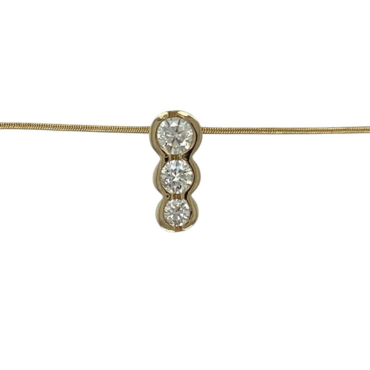 Bring refined sparkle and elegant detail to your collection with this pre-owned 14ct yellow gold three-stone diamond pendant, paired with an 18-inch snake chain for a sleek and timeless finish.

Design: The pendant measures 1.3cm long and features three round brilliant diamonds in a rubover setting, with a total diamond weight of approximately 0.47ct. The stones are graded at around SI1 clarity and J–K colour, offering eye-catching brilliance with a warm tone.