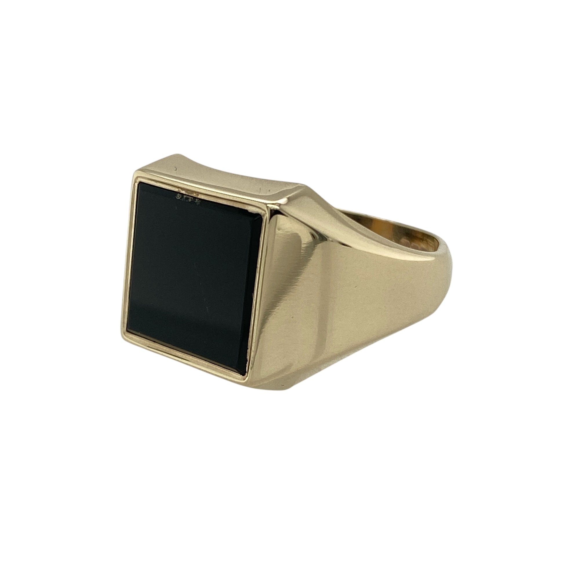 Bring bold style and classic design to your collection with this pre-owned 9ct yellow gold onyx signet ring—a timeless piece with strong presence and sophistication.

Design: The ring features a 12mm by 12mm square onyx stone, creating a striking contrast against the polished gold and a distinctive focal point.
Material: Made from 9-carat yellow gold with an onyx centre, the polished finish highlights the sleek black stone and rich golden tones.