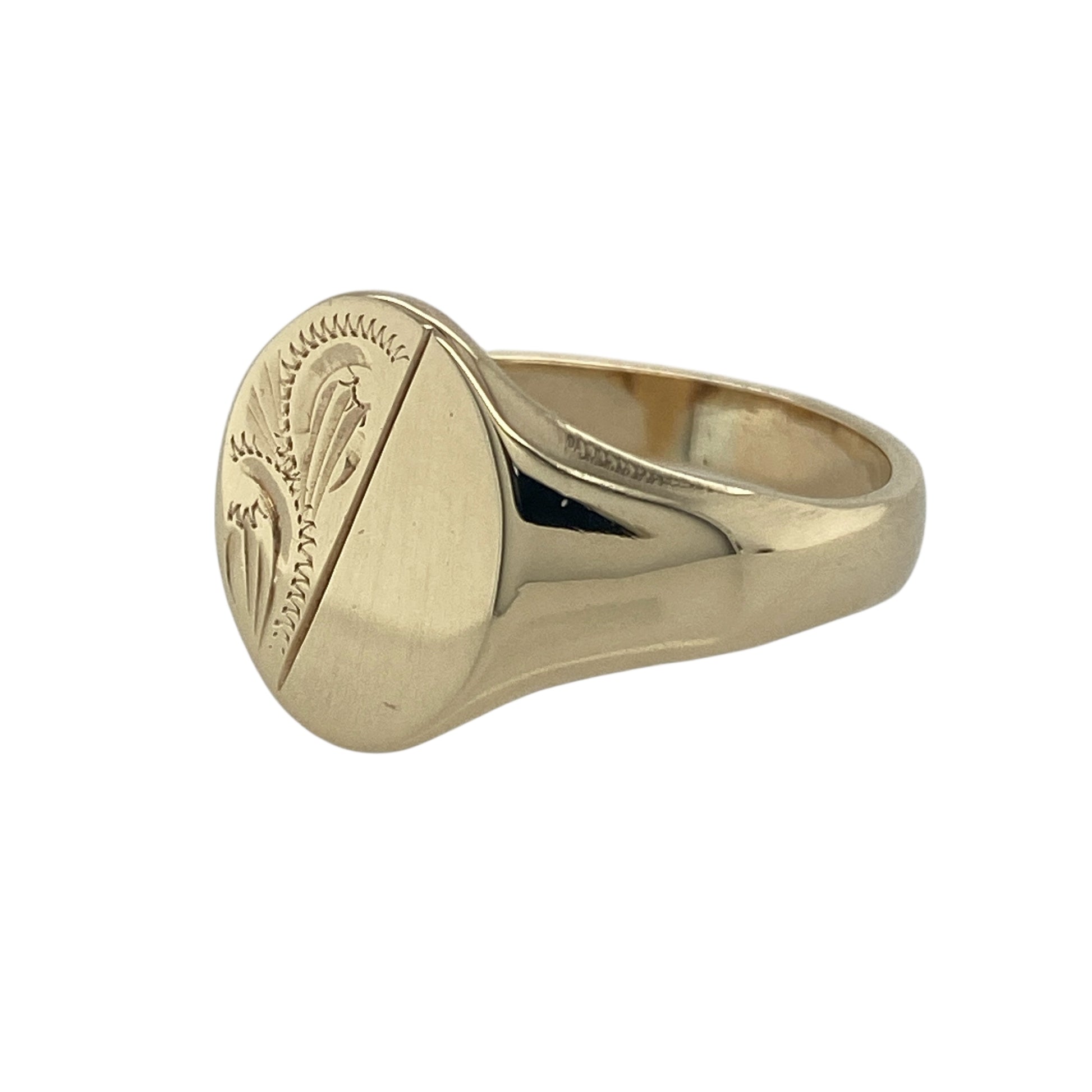 Bring classic style and bold presence to your collection with this pre-owned 9ct yellow gold patterned oval signet ring—a timeless piece with strong character.

Design: The ring features a 14mm high oval front with an engraved patterned finish, giving the traditional signet style added depth and detail.
Material: Made from 9-carat yellow gold, the polished surface highlights the engraved texture and warm golden tones.