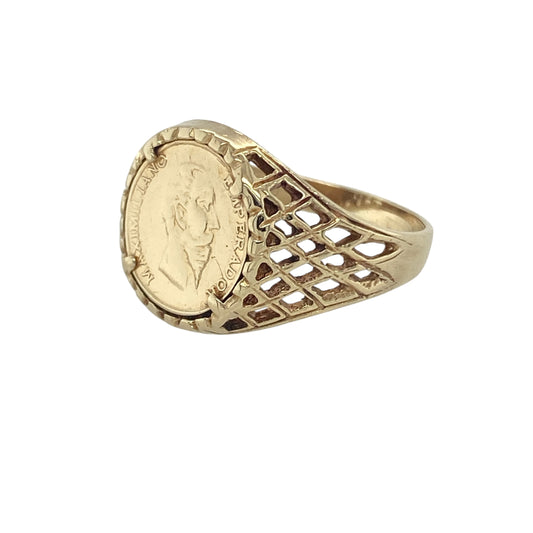 A unique and eye-catching addition to any jewellery collection, this pre-owned 9ct yellow gold coin ring features a distinctive design with intricate details.

Design: A bold coin feature at the centre, inscribed with "Maximiliano Emperador," surrounded by shoulders that have a cut-open pattern for added texture and elegance.
Material: Made from 9-carat yellow gold, offering a rich and polished finish.