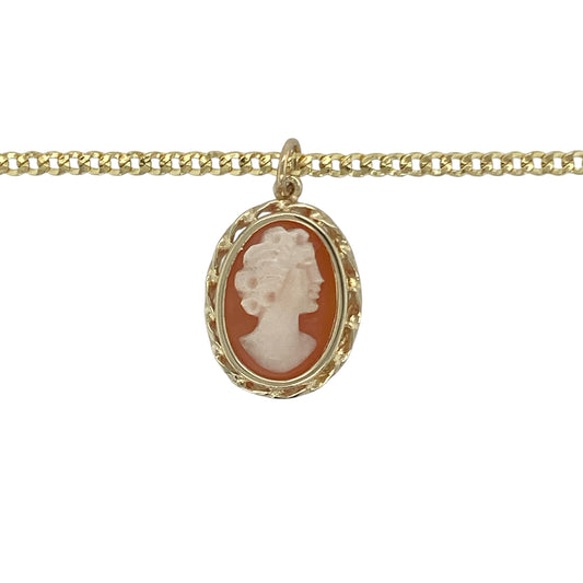 Bring vintage charm and timeless elegance to your collection with this pre-owned 9ct yellow gold oval cameo pendant, paired with an 18-inch curb chain for a classic finish.

Design: The pendant measures 2.2cm long including the bail and showcases a 13mm by 9mm oval cameo stone, carved with delicate detail for a refined and traditional look.
Material: Made from 9-carat yellow gold with a cameo stone, the polished finish highlights both the warm gold tones and the intricate carving.