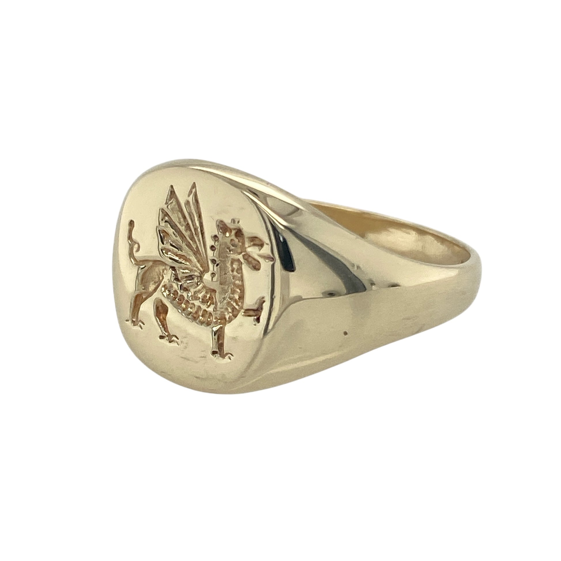Bring heritage pride and classic style to your collection with this pre-owned 9ct yellow gold Welsh Dragon signet ring—a bold design symbolising strength and tradition.

Design: The ring features a 13mm high round front engraved with the iconic Welsh Dragon, representing courage, power, and national pride.
Material: Made from 9-carat yellow gold, the polished finish enhances the engraved detail and rich golden tones.