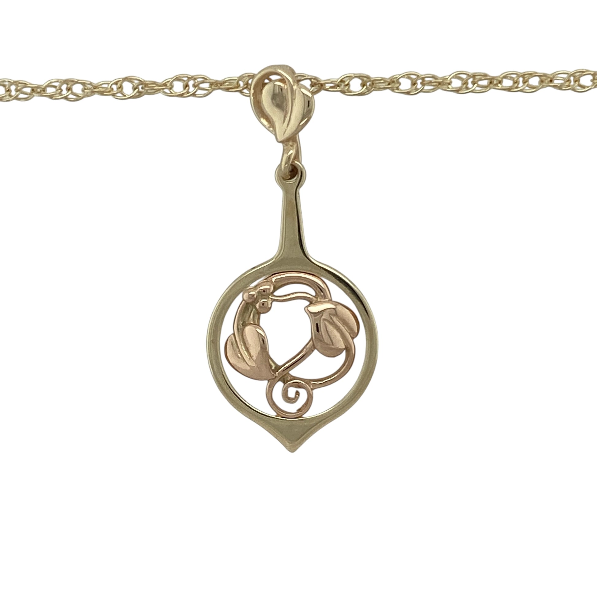 Bring symbolic beauty and timeless detail to your collection with this pre-owned Clogau Tree of Life pendant in 9ct yellow and rose gold, paired with an 18-inch Prince of Wales chain for a classic finish.

Design: The pendant measures 3.8cm long and features the iconic Tree of Life motif, symbolising growth, renewal, and harmony, accented with rose gold detailing for contrast.
Material: Made from 9-carat yellow and rose gold, the polished surface highlights the intricate two-tone design.