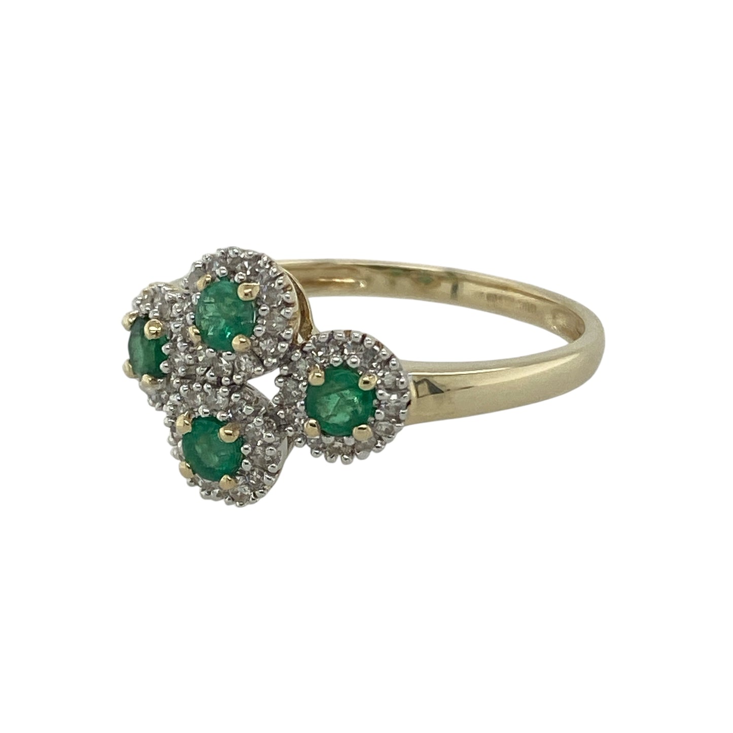 Bring vibrant colour and elegant sparkle to your collection with this pre-owned 9ct yellow gold emerald and diamond cluster ring—a timeless design with refined detail.

Design: The ring features four clusters, each centred with a 3mm round emerald surrounded by a halo of small diamonds, creating brilliance and contrast.
Material: Made from 9-carat yellow gold with emerald and diamond accents, the polished finish enhances the rich green tones of the emeralds and the sparkle of the diamonds.