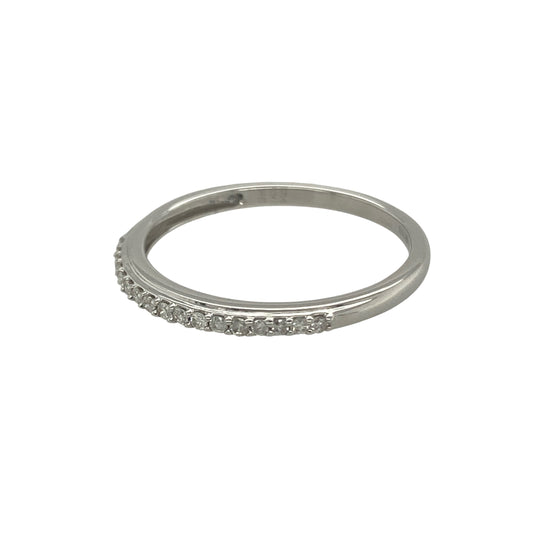 Bring subtle sparkle and refined elegance to your collection with this pre-owned 9ct white gold diamond band ring, a versatile piece perfect for everyday wear or special occasions.

Design: The ring features a 2mm wide band with approximately 0.12ct of brilliant-cut diamonds set across the surface, adding a touch of understated radiance.
Material: Made from 9-carat white gold, the polished finish enhances the diamonds’ natural brilliance while offering a sleek and modern look.