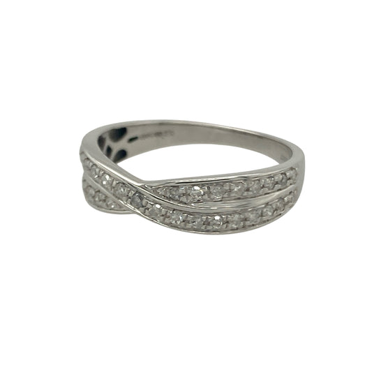 Bring modern elegance and sparkling detail to your collection with this pre-owned 18ct white gold diamond crossover band ring, a stylish design that balances sophistication with everyday wearability.

Design: The ring features an elegant crossover style band, set with approximately 0.25ct of brilliant-cut diamonds that add radiant sparkle across the design.
Material: Made from 18-carat white gold, the polished finish enhances the brilliance of the diamonds while offering a sleek, contemporary look.