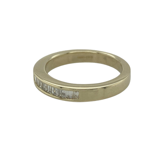Bring refined style and elegant sparkle to your collection with this pre-owned 9ct yellow gold diamond band ring, a timeless design with a modern touch.

Design: The ring features a 3mm wide front set with baguette-cut diamonds, creating a sleek and sophisticated look with subtle brilliance.
Material: Made from 9-carat yellow gold, the polished finish enhances the clean lines of the baguette diamonds and adds warmth to the design.