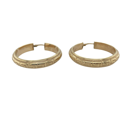 Bring classic design and bold detail to your collection with these pre-owned 9ct yellow gold Greek key patterned hoop creole earrings, a timeless style with a distinctive edge.

Design: The earrings feature a traditional hoop creole shape, detailed with the iconic Greek key pattern for a stylish and eye-catching finish.
Material: Made from 9-carat yellow gold, the polished surface enhances the geometric design and adds warmth to the look.