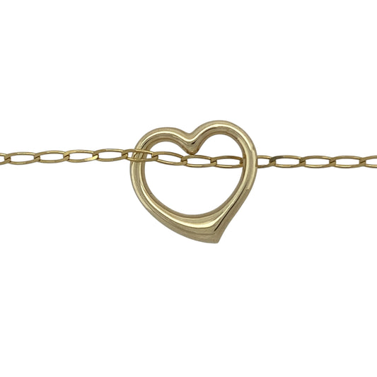 Bring romantic charm and classic style to your collection with this pre-owned 9ct yellow gold open heart pendant on a 20" curb chain, a timeless piece with sentimental appeal.

Design: The pendant features a 16mm by 16mm open heart design, simple yet elegant, symbolising love and affection.
Material: Made from 9-carat yellow gold, the polished finish adds warmth and shine to the heart pendant and chain.