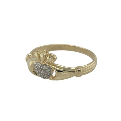 Bring symbolic meaning and timeless tradition to your collection with this pre-owned 9ct yellow and white gold diamond Claddagh ring, a classic design representing love, loyalty, and friendship.

Design: The ring features an 8mm high front in the traditional Claddagh style, with a crowned heart held by hands, accented with sparkling diamonds for added brilliance.
Material: Made from 9-carat yellow and white gold, the polished two-tone finish highlights the iconic design and adds elegant contrast.
