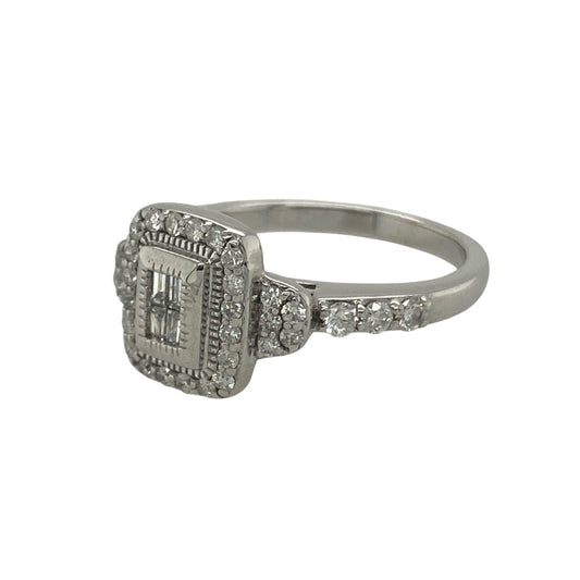 Bring dazzling sparkle and elegant design to your collection with this pre-owned 14ct white gold diamond cluster halo ring, a statement piece full of brilliance.

Design: The ring features a 10mm high cluster centre made up of four baguette-cut diamonds surrounded by a halo of brilliant-cut diamonds, with additional diamonds set along the shoulders. Together the diamonds total approximately 0.41ct.