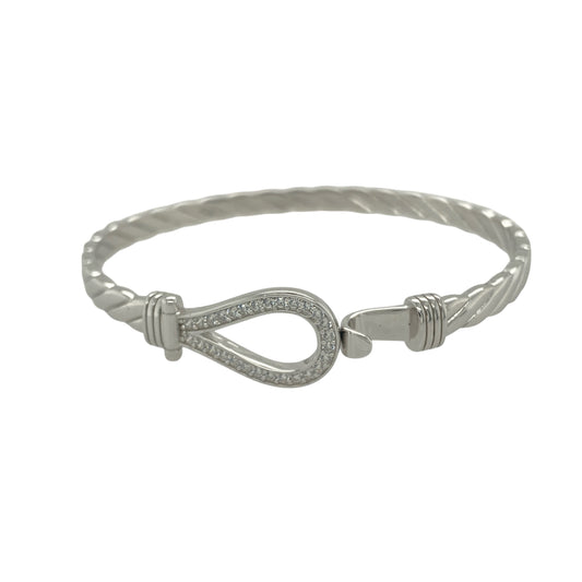 Bring charm and sparkle to your collection with this new 925 silver cubic zirconia children’s horseshoe bangle, a delightful design symbolising luck and happiness.

Design: The bangle features an 11mm high front with a classic horseshoe motif, accented with sparkling cubic zirconia stones for a bright and elegant finish.
Material: Made from solid 925 sterling silver, the polished surface enhances the shine and adds a sleek, refined look.