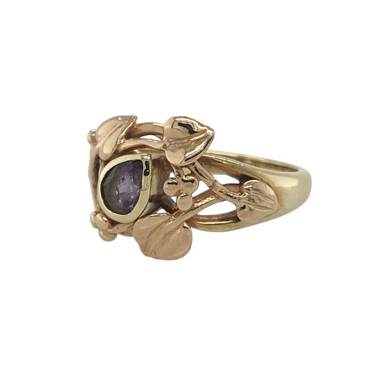 Bring warmth, heritage, and natural beauty to your jewellery collection with this pre-owned 9ct yellow and rose gold amethyst Clogau Tree of Life ring—a meaningful design combining Welsh inspiration with elegant colour.

Design: The ring features Clogau’s signature Tree of Life motif, intertwining vines of yellow and rose gold that symbolise growth, strength, and new beginnings. At its heart lies a teardrop-shaped amethyst measuring 5mm by 4mm