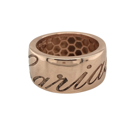 Bring warmth, elegance, and heartfelt meaning to your collection with this pre-owned 9ct rose gold Clogau Cariad wide band ring—a bold and beautiful expression of love and connection.

Design: The ring features Clogau’s signature Cariad inscription, meaning “beloved” in Welsh, symbolising deep affection and enduring commitment. Its wide band design makes a confident statement while retaining the romantic charm of Clogau’s craftsmanship.