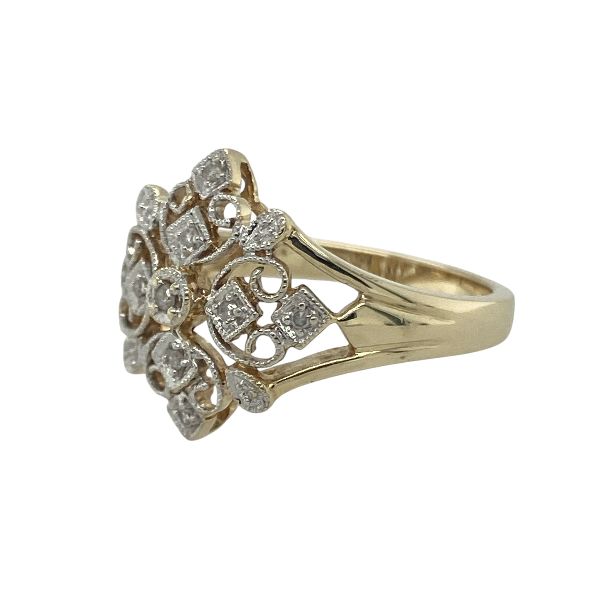 Bring vintage charm and delicate sparkle to your collection with this pre-owned 9ct yellow and white gold diamond filigree flower ring—a beautifully detailed design that captures timeless elegance.

Design: The ring features an intricate openwork filigree flower design, highlighted with diamond accents that add subtle brilliance and sophistication. The floral pattern brings a romantic, vintage-inspired appeal to the piece.