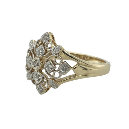 Bring vintage charm and delicate sparkle to your collection with this pre-owned 9ct yellow and white gold diamond filigree flower ring—a beautifully detailed design that captures timeless elegance.

Design: The ring features an intricate openwork filigree flower design, highlighted with diamond accents that add subtle brilliance and sophistication. The floral pattern brings a romantic, vintage-inspired appeal to the piece.