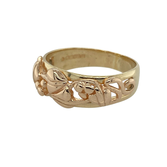Bring symbolic elegance and heritage style to your collection with this pre-owned Clogau Tree of Life ring in 9ct yellow and rose gold—a meaningful design representing growth, strength, and harmony.

Design: The ring features an 8mm wide front adorned with the iconic Tree of Life motif, blending yellow and rose gold for a distinctive two-tone finish.
Material: Made from 9-carat yellow and rose gold, the polished surface enhances the intricate detailing and warm tones of the design.