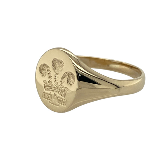 Bring tradition, pride, and classic style to your collection with this pre-owned 9ct yellow gold oval Welsh Three Feathers signet ring—a distinguished piece celebrating heritage and craftsmanship.

Design: The ring features the iconic Welsh Three Feathers emblem engraved on an oval-shaped face, symbolising courage, honour, and loyalty. The polished finish enhances the fine detailing, giving it a refined and timeless appearance.
