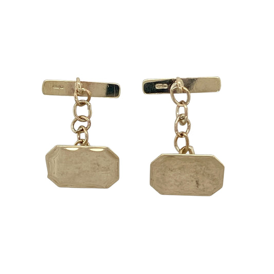 Bring sophistication and timeless style to your collection with these pre-owned 9ct gold rectangular cufflinks—a refined accessory that adds a touch of classic elegance to any formal look.

Design: The cufflinks feature a polished rectangular shape with a diamond-cut border surrounding a plain centre, creating a striking contrast between texture and smoothness. The design offers understated luxury with a contemporary edge.