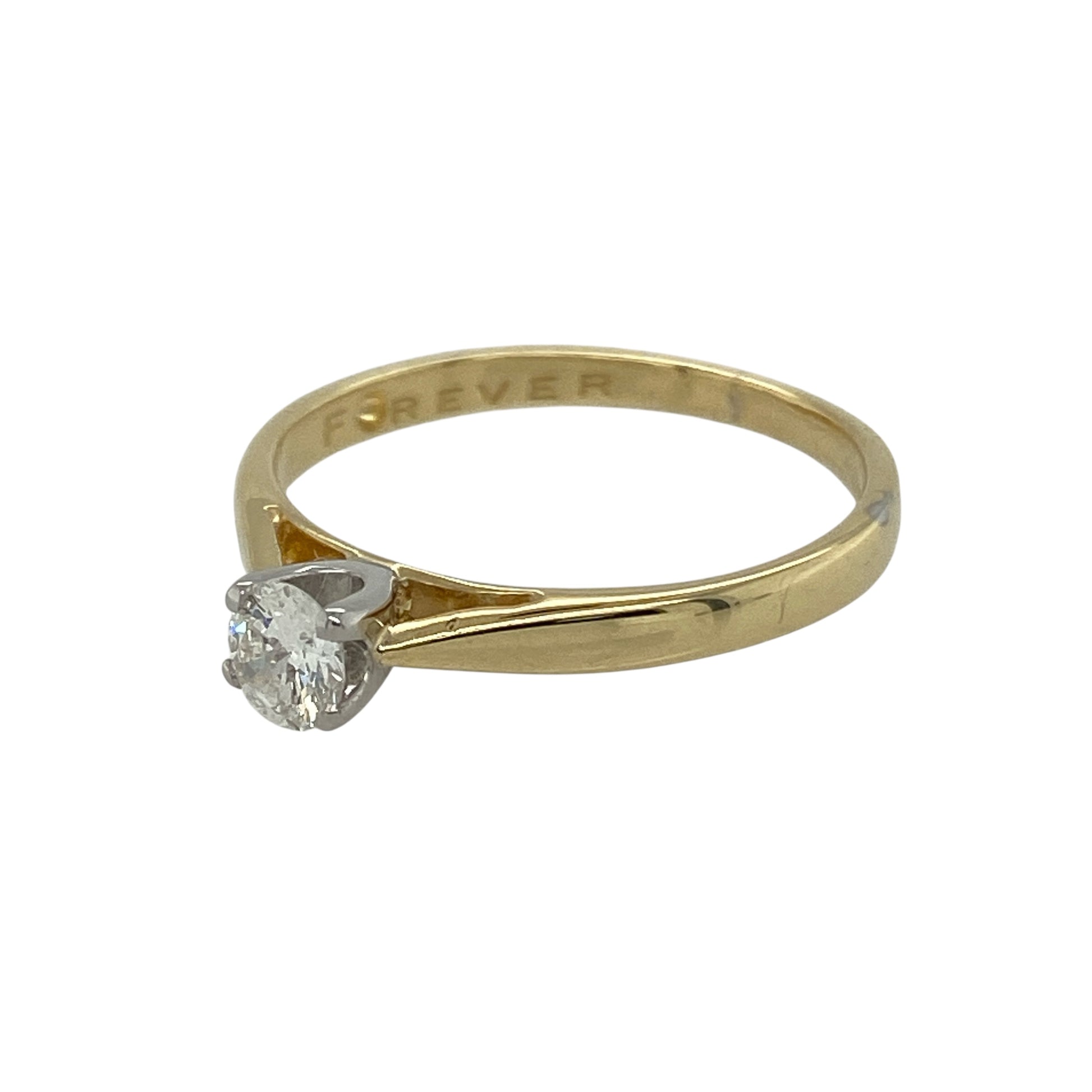 Bring timeless elegance and refined sparkle to your collection with this pre-owned 18ct yellow gold diamond solitaire ring—a classic design that embodies sophistication and enduring beauty.

Design: The ring features a brilliant-cut diamond of approximately 0.25ct, offering bright fire and beautiful symmetry. With an estimated clarity of Si1, the diamond displays excellent sparkle and radiance, perfectly complemented by its simple, elegant setting.