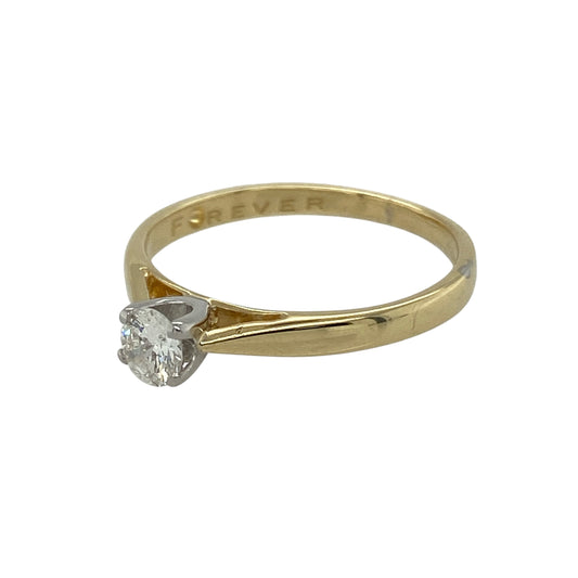 Bring timeless elegance and refined sparkle to your collection with this pre-owned 18ct yellow gold diamond solitaire ring—a classic design that embodies sophistication and enduring beauty.

Design: The ring features a brilliant-cut diamond of approximately 0.25ct, offering bright fire and beautiful symmetry. With an estimated clarity of Si1, the diamond displays excellent sparkle and radiance, perfectly complemented by its simple, elegant setting.