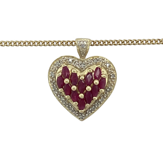 Bring romance, colour, and sparkle to your collection with this pre-owned 9ct yellow gold diamond and ruby heart pendant on an 18" curb chain necklace—a stunning design that radiates timeless elegance and sentiment.

Design: The pendant features a cluster of rich red ruby stones at the centre, surrounded by a border of sparkling diamonds forming a classic heart shape. The combination of vibrant colour and brilliant sparkle creates a luxurious and romantic look.