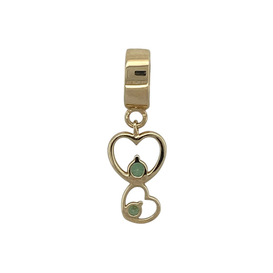 Bring romance, colour, and classic charm to your collection with this pre-owned 9ct yellow gold green stone double heart pendant—a beautifully symbolic piece representing love and connection.

Design: The pendant features two interlinked hearts, one adorned with a vibrant green stone that adds a touch of colour and elegance. The double heart design symbolises unity and affection, creating a timeless and meaningful look.