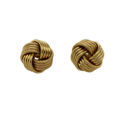 Bring classic charm and elegant texture to your collection with these pre-owned 9ct yellow gold patterned knot stud earrings, combining timeless design with refined detail—perfect for everyday wear or special occasions.

Design: The earrings feature a traditional knot design measuring 12mm, enhanced with a subtle patterned finish that adds depth and sophistication to the classic style.
Material: Made from 9-carat yellow gold