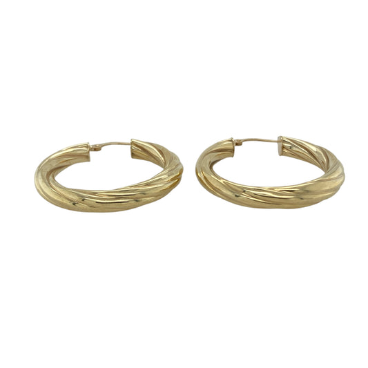 Bring timeless elegance and radiant detail to your collection with these pre-owned 9ct yellow gold twisted hoop creole earrings, combining classic design with a touch of modern sophistication—perfect for both everyday wear and special occasions.

Design: The earrings feature a stylish twisted hoop creole design that catches the light beautifully, adding movement, texture, and subtle sparkle to a traditional silhouette.