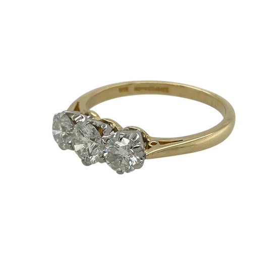 Bring timeless elegance and refined sparkle to your collection with this pre-owned 18ct yellow gold diamond trilogy ring, combining classic design with luxurious brilliance—perfect for special occasions or lasting everyday sophistication.

Design: The ring features a traditional trilogy arrangement with three dazzling diamonds totalling approximately 1 carat, symbolising past, present, and future. The stones display an approximate clarity of Si2–I1 and colour range of J–K