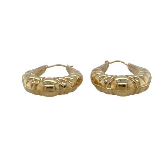 Bring bold texture and contemporary elegance to your collection with these pre-owned 9ct yellow gold bubble-style oval creole earrings, combining playful design with timeless sophistication—perfect for both everyday wear and special occasions.

Design: Each earring features an oval creole shape with a distinctive bubble-style pattern, adding depth, shine, and a modern twist to a classic silhouette.