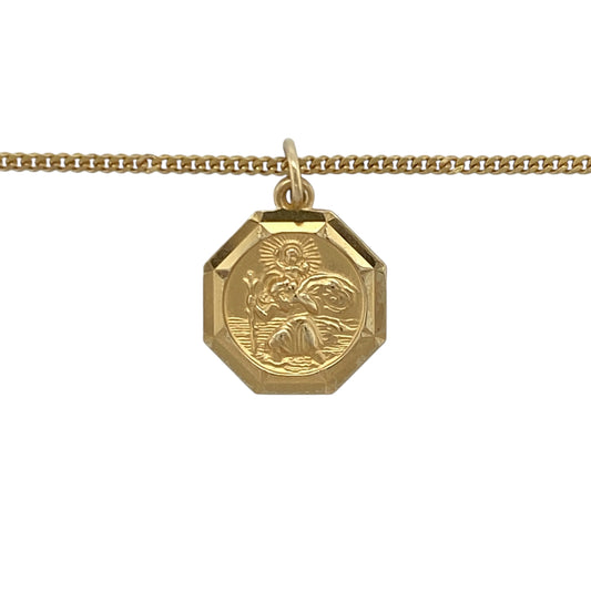 Bring classic faith and timeless style to your collection with this pre-owned 9ct yellow gold octagon-shaped St Christopher pendant on an 18" curb chain necklace, symbolising protection and safe travels—perfect for everyday wear or as a meaningful gift.

Design: The pendant features an octagon shape with a detailed depiction of St Christopher, measuring 1.9cm long including the bail, and is suspended from an 18" curb chain for a polished, elegant look.