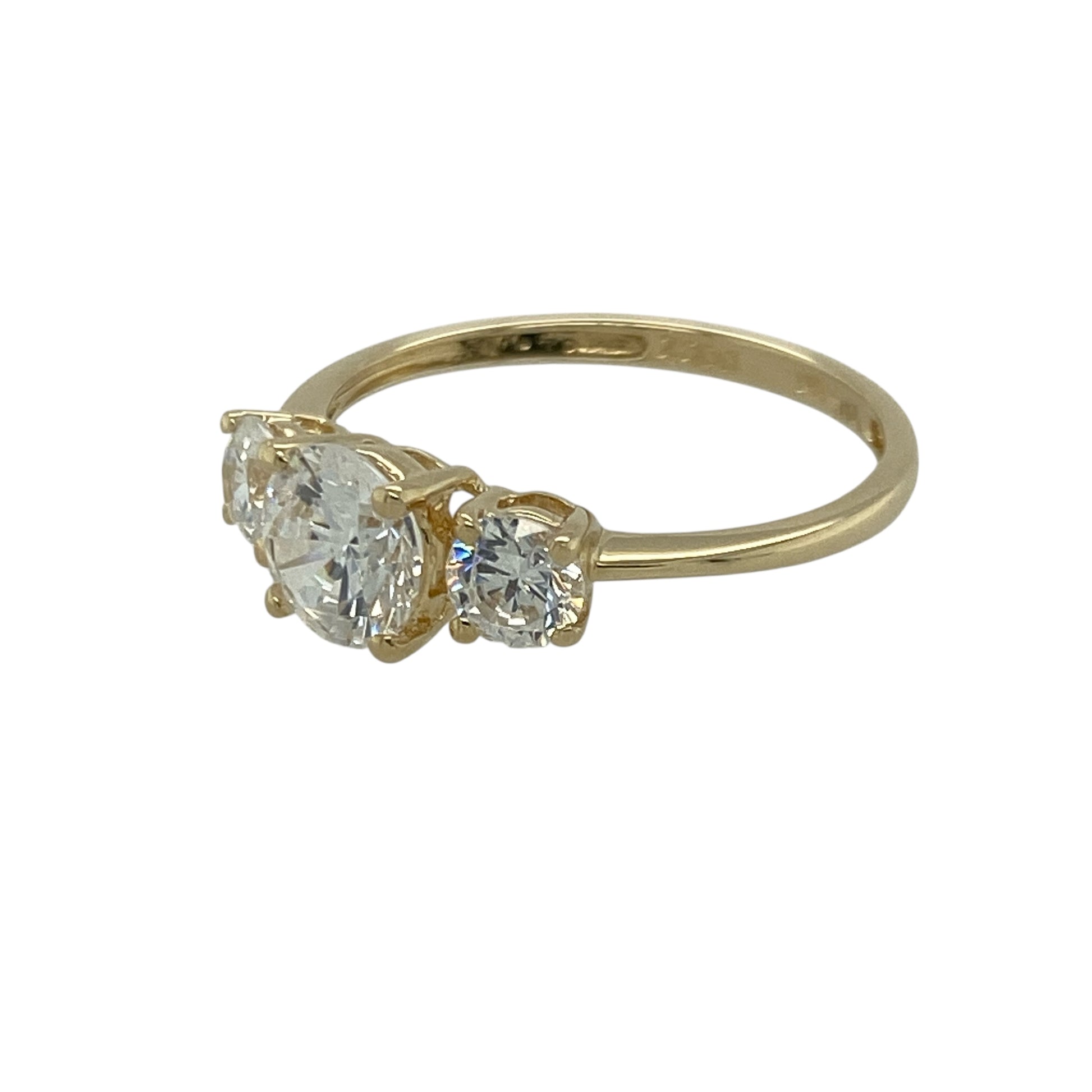 Bring refined sparkle and timeless elegance to your collection with this pre-owned 14ct yellow gold cubic zirconia trilogy ring, combining classic design with radiant brilliance—perfect for both everyday wear and special occasions.

Design: The ring features a central cubic zirconia measuring 6mm in diameter, flanked by two 4mm side stones in a balanced trilogy arrangement, symbolising past, present, and future.
