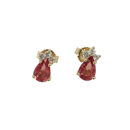 Bring vibrant colour and refined sparkle to your jewellery collection with these pre-owned 9ct yellow gold red/orangey stone and cubic zirconia set stud earrings—perfect for both day and evening wear.

Design: Each earring features a striking 6mm by 4mm teardrop-shaped red/orangey stone, elegantly accented with shimmering cubic zirconias on top. The combination of colour and sparkle creates a timeless, eye-catching design.