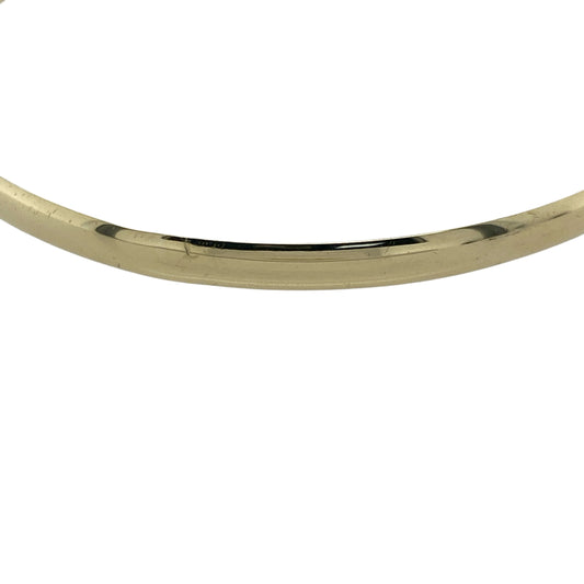 Bring sleek simplicity and timeless elegance to your look with this pre-owned 9ct yellow solid gold plain bangle—perfect for everyday wear or pairing with other gold pieces.

Design: The bangle features a smooth, polished 4mm-wide band with a classic plain finish, offering a minimalist and versatile style that complements any outfit.
Material: Made from solid 9-carat yellow gold, the rich tone provides lasting shine and durability for years of wear.
