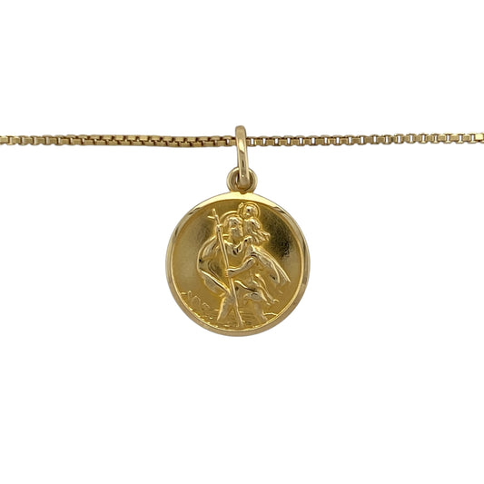 Bring faith and timeless elegance to your collection with this pre-owned 18ct yellow gold St Christopher pendant necklace—perfect as a meaningful keepsake or everyday statement of protection.

Design: The necklace features a detailed St Christopher pendant measuring 2.6cm long, including the bail, depicting the patron saint of travellers in a classic round design. It hangs beautifully from an 18-inch box chain, adding refined structure and shine.