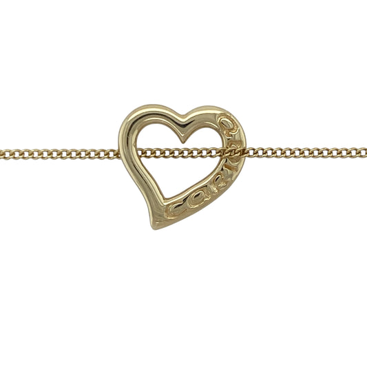 Bring romance and elegance to your collection with this pre-owned 9ct yellow gold Clogau open heart Cariad pendant necklace—perfect for expressing love and connection in timeless style.

Design: The necklace features Clogau’s signature open heart Cariad pendant, measuring 1.9cm long, symbolising love, friendship, and devotion. The flowing heart design reflects warmth and sentiment, making it a meaningful addition to any collection.