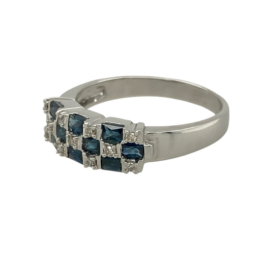 Bring striking colour and refined sparkle to your collection with this pre-owned 14ct white gold diamond and sapphire set three-row band ring—perfect for adding a touch of timeless luxury to any look.

Design: The ring features a 6mm-wide front composed of three elegant rows of rectangular-cut sapphires, each separated by small round diamonds. The geometric arrangement creates a beautiful balance of structure, colour, and brilliance.